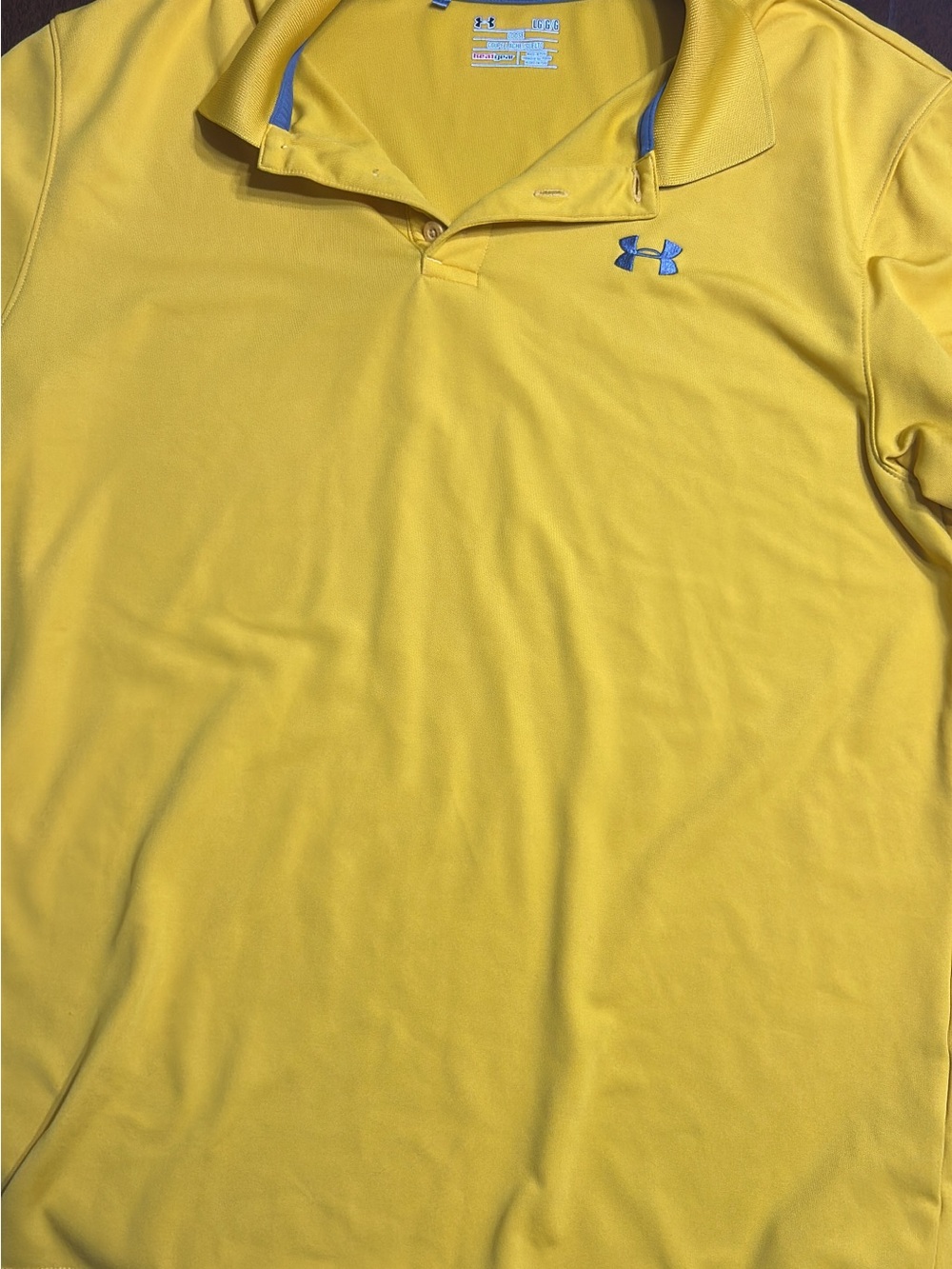 Under Armour Men's Yellow Gold Polo with Blue Logo Accents